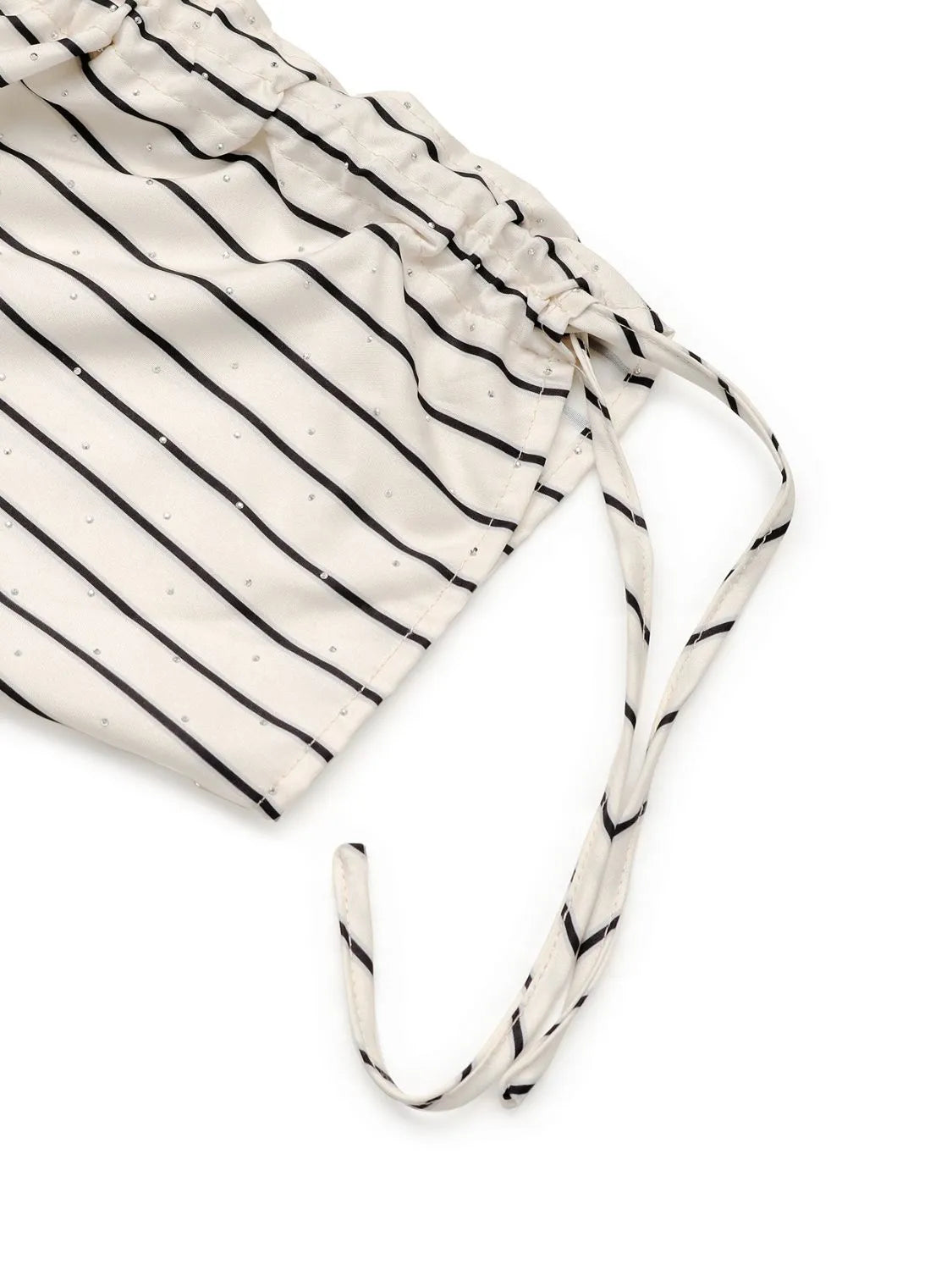 Women's Striped Half Sleeve Blouse laid flat on a table with accessories