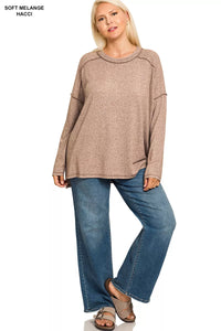 Plus Size Hi-Low Tunic Top with exposed seams in charcoal gray on a model.
