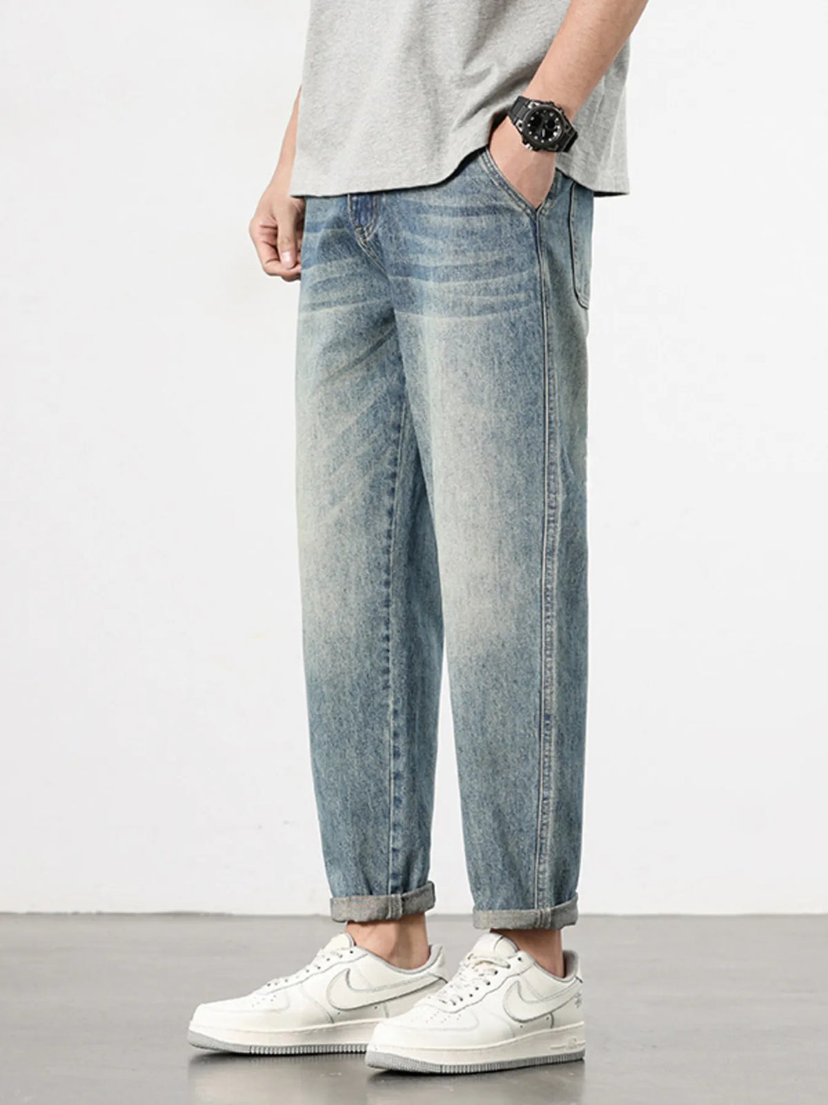 Mens loose fit washed jeans front view, relaxed regular fit casual denim pants