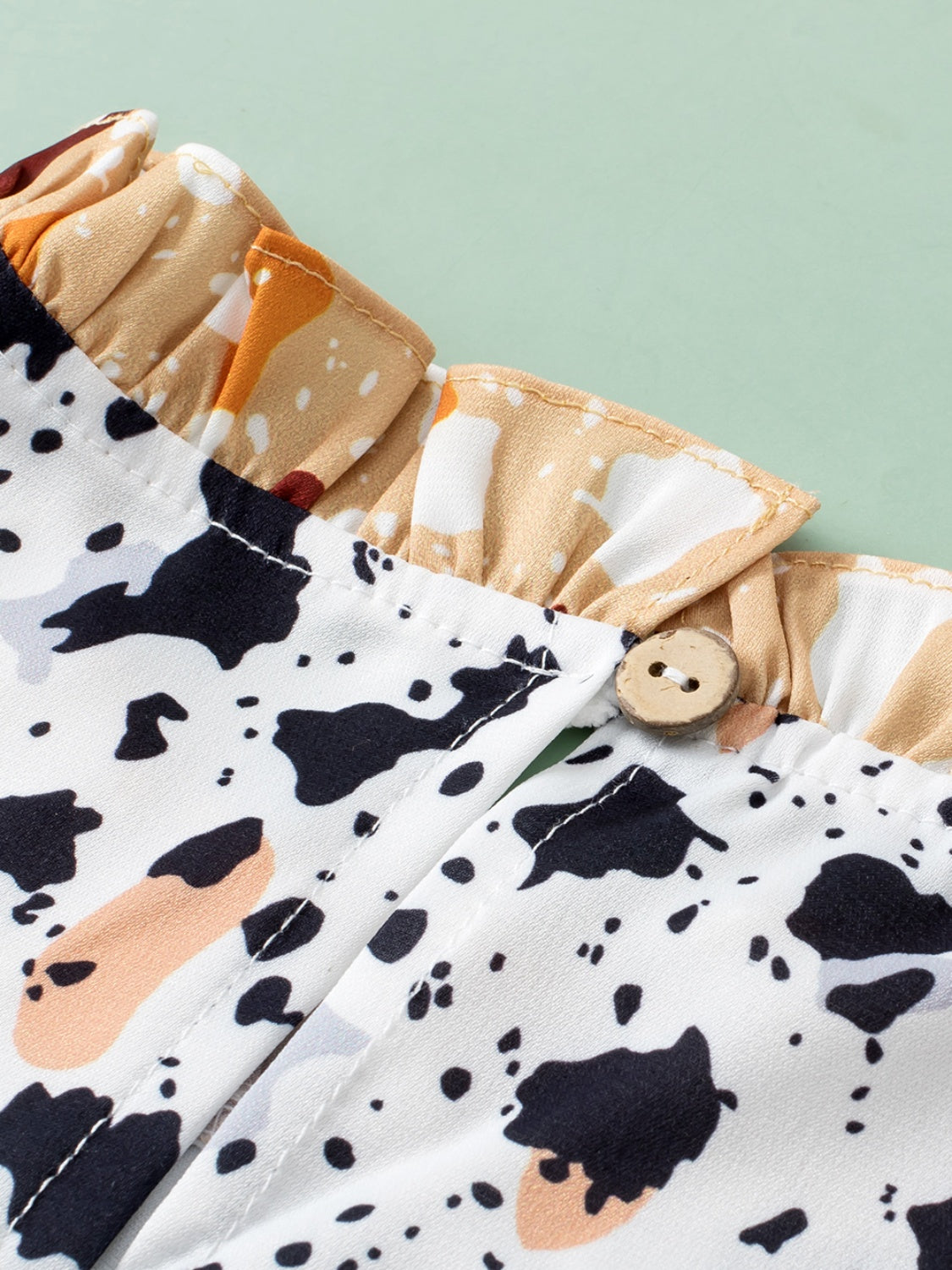 Ruffled Printed Mock Neck Cap Sleeve Blouse Trandify deal