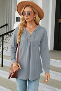 Decorative Button Drawstring Long Sleeve Hoodie Trendsi