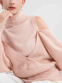 Oversized Cold Shoulder Sweater in Cream knit worn with denim jeans