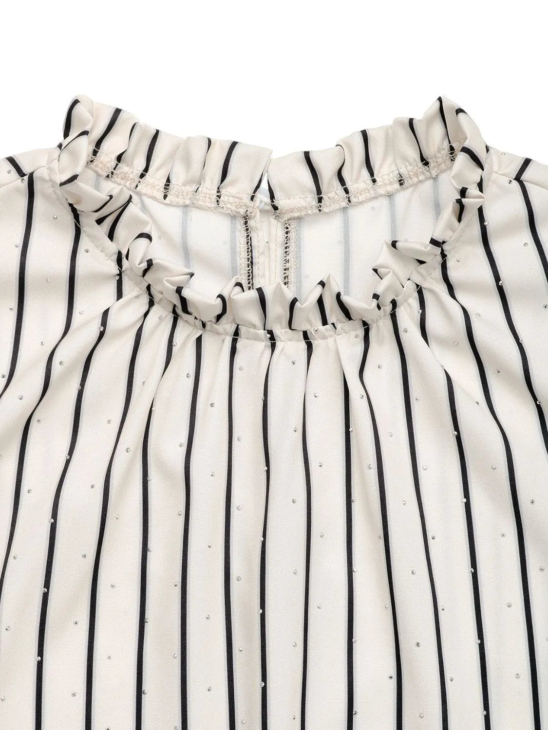 Women's Striped Half Sleeve Blouse laid flat on a table with accessories