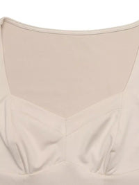 Women's sweetheart neck balloon sleeve bodysuit outfit, Apricot, styled with jeans.
