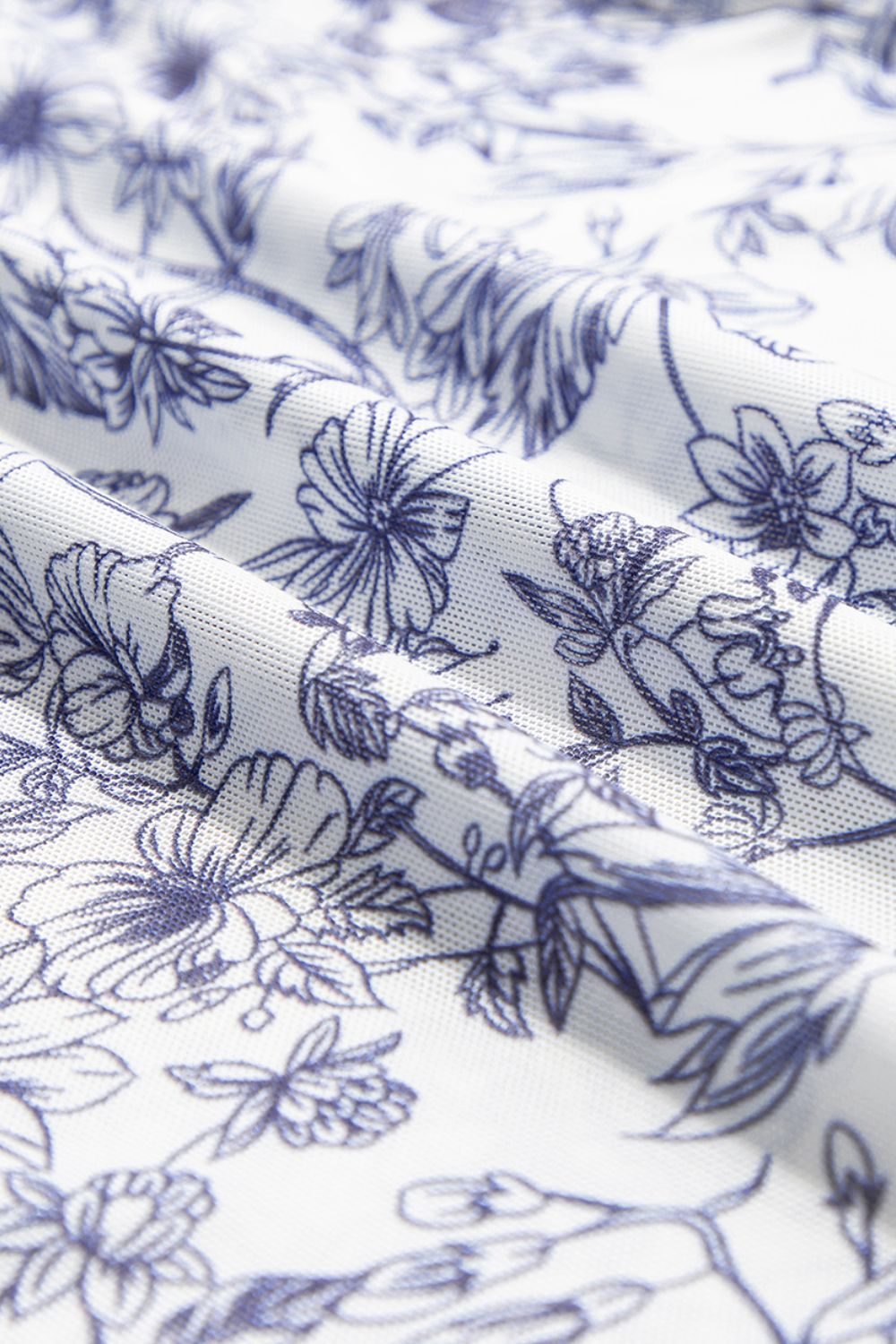 Women’s stylish mock neck blouse in floral print, U.S. fashion trend 2025