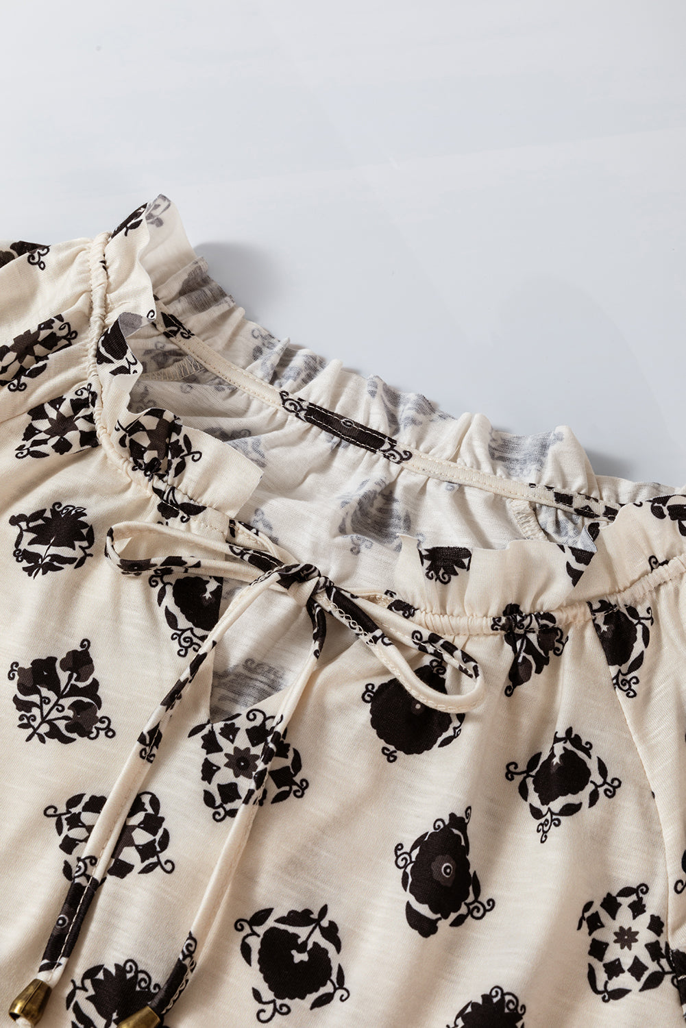 Printed Tie Neck Long Sleeve Blouse Trandify Deal