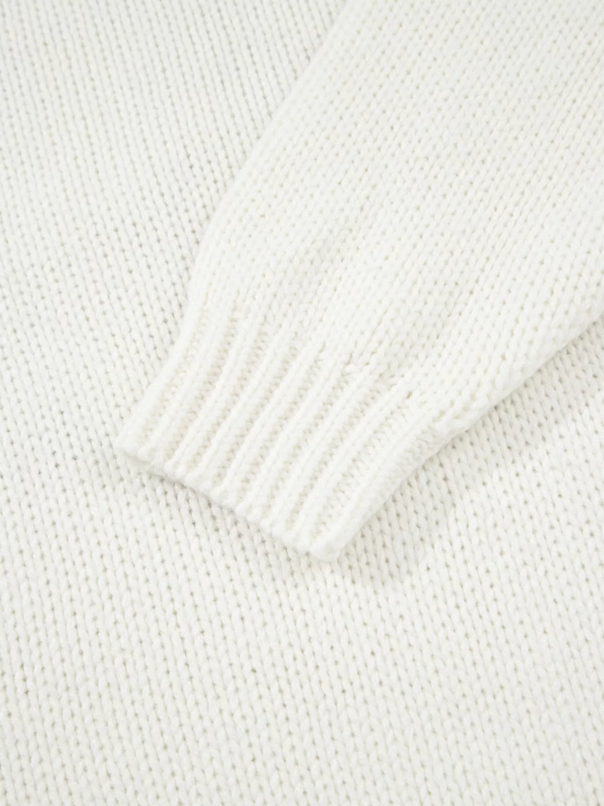 Women's Embroidered Bow Boots Drop Shoulder Sweater in cream, laid flat showing the detailed boot and bow design on the front.