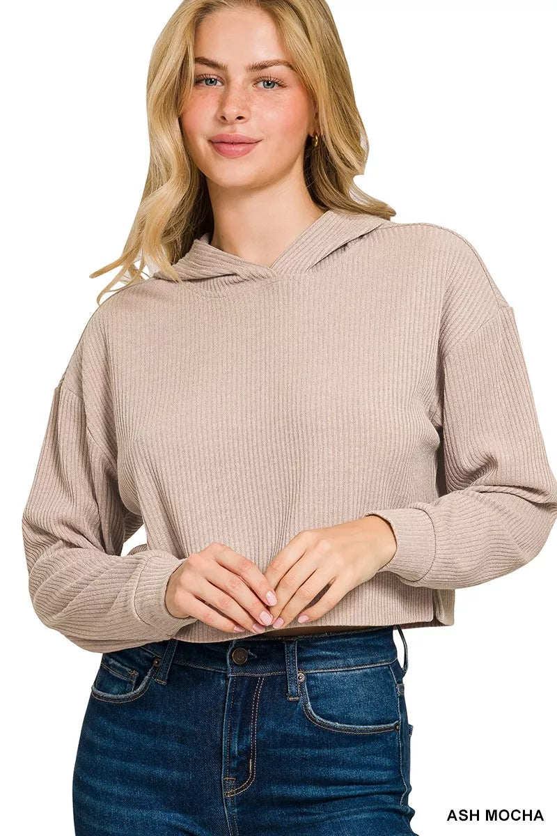 Ribbed Crop Hoodie in Being showing the drop-shoulder and oversized fit on a model.