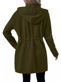 Women's lightweight zip up hoodie jacket in Green with front pockets.
