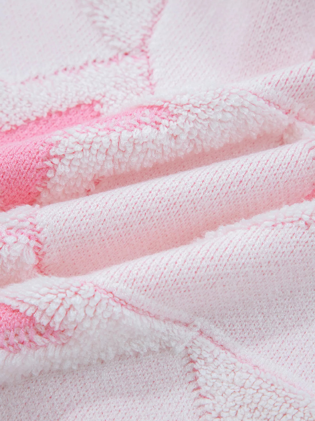 Oversized Star Pattern Sweater in White worn with boots