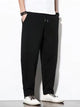 Men's plus size loose fit cargo pants in Black with drawstring waist