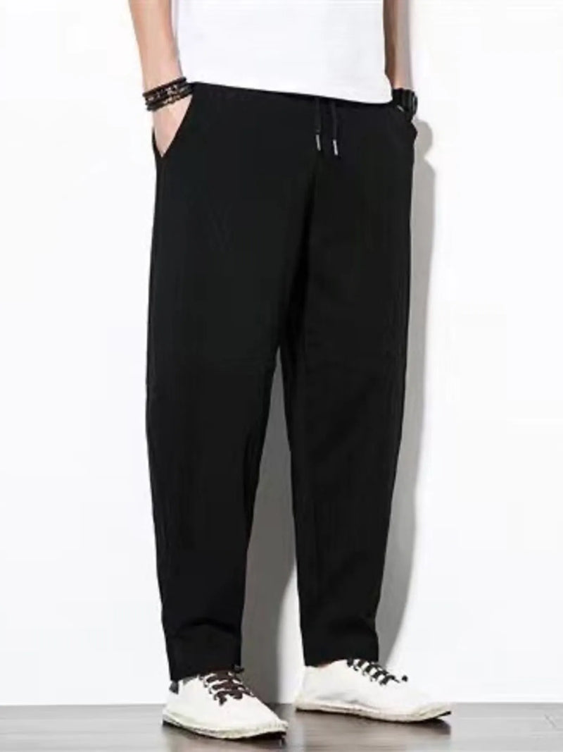 Men's plus size loose fit cargo pants in Black with drawstring waist