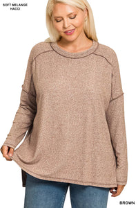 Plus Size Hi-Low Tunic Top with exposed seams in charcoal gray on a model.