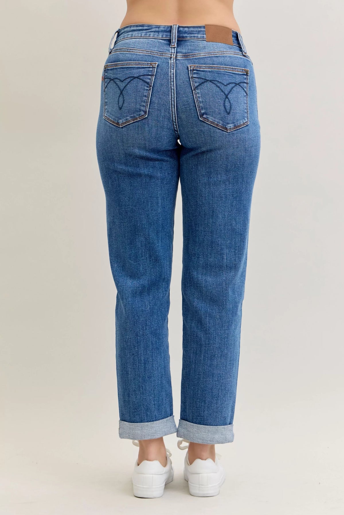 Plus Size Judy Blue Cuffed Jeans in a mid-rise, classic fit shown on a model.