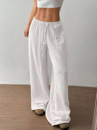 Women's plus size cotton drawstring wide leg pants in White, showing relaxed fit and tie waist.