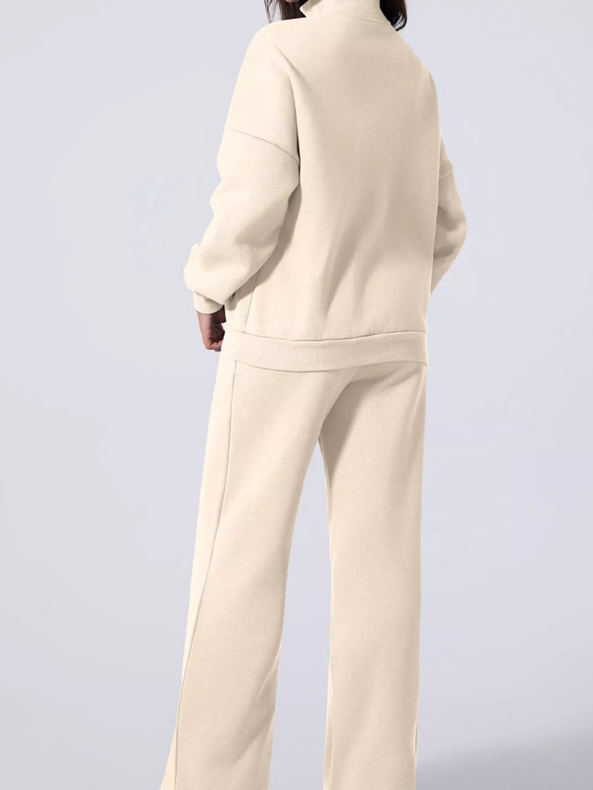 Women's Zip Up Jogger Set in Beige on model showing pockets