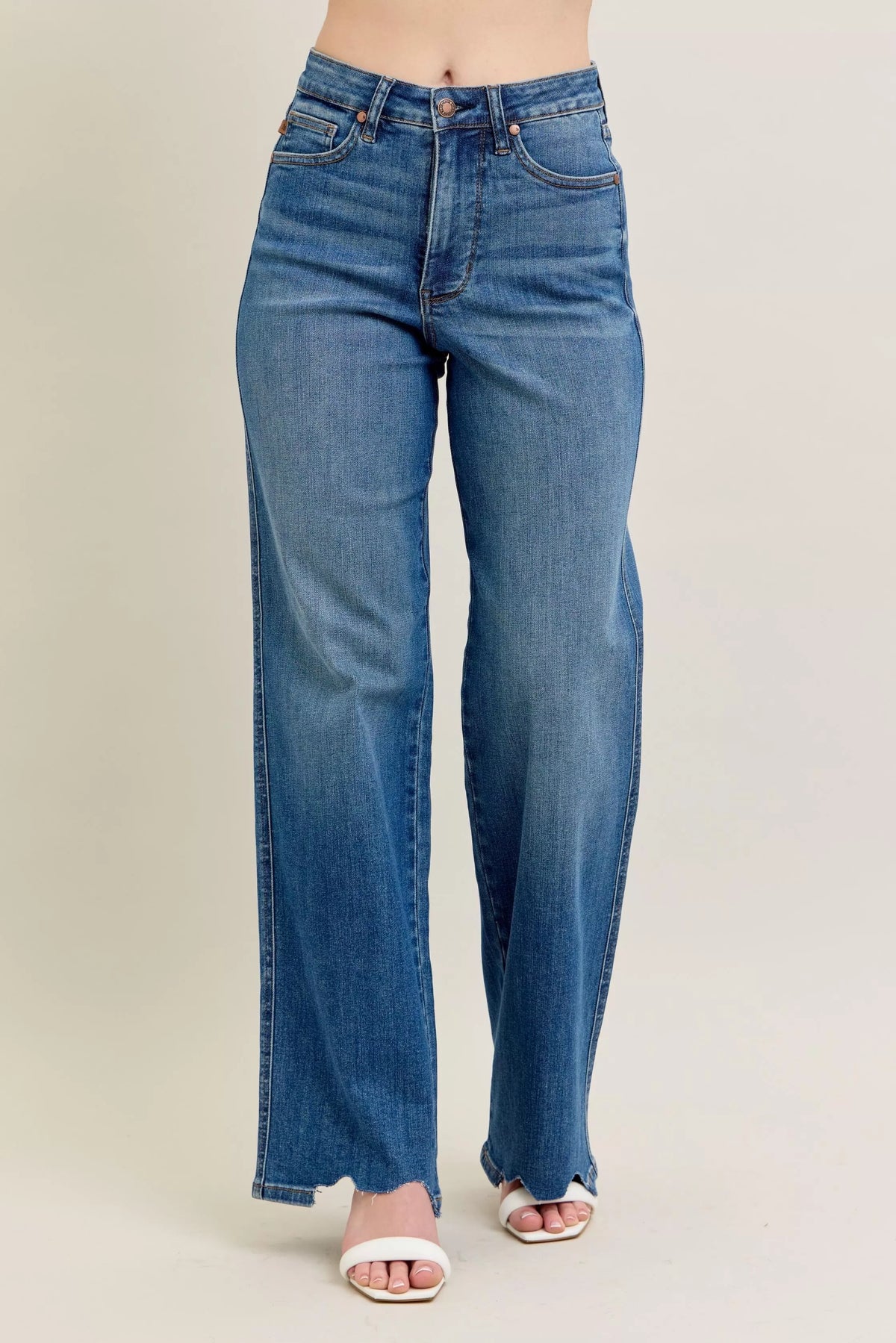 High Waist Tummy Control Jeans with Destroyed Hem on a plus-size model.