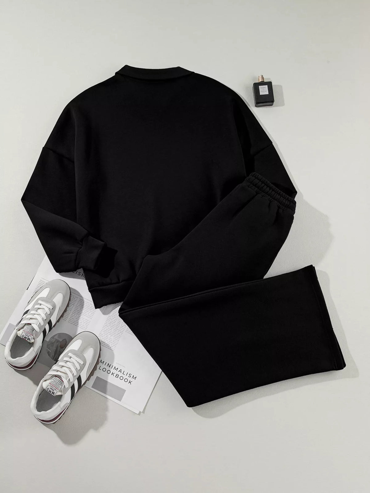 Women's Zip Up Jogger Set in Black on model showing pockets