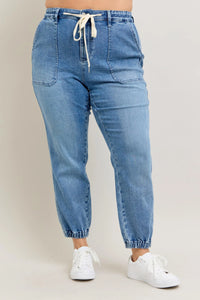 Judy Blue High Waist Denim Jogger in blue wash on model