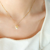Titanium Steel Bow & Bead Pendant Necklace Trandify deal