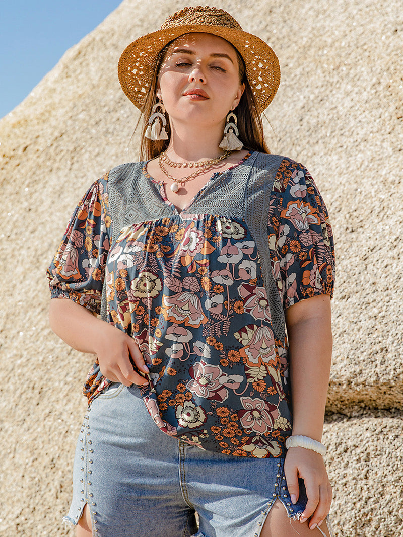 Plus Size Printed Notched Half Sleeve Blouse Trandify deal