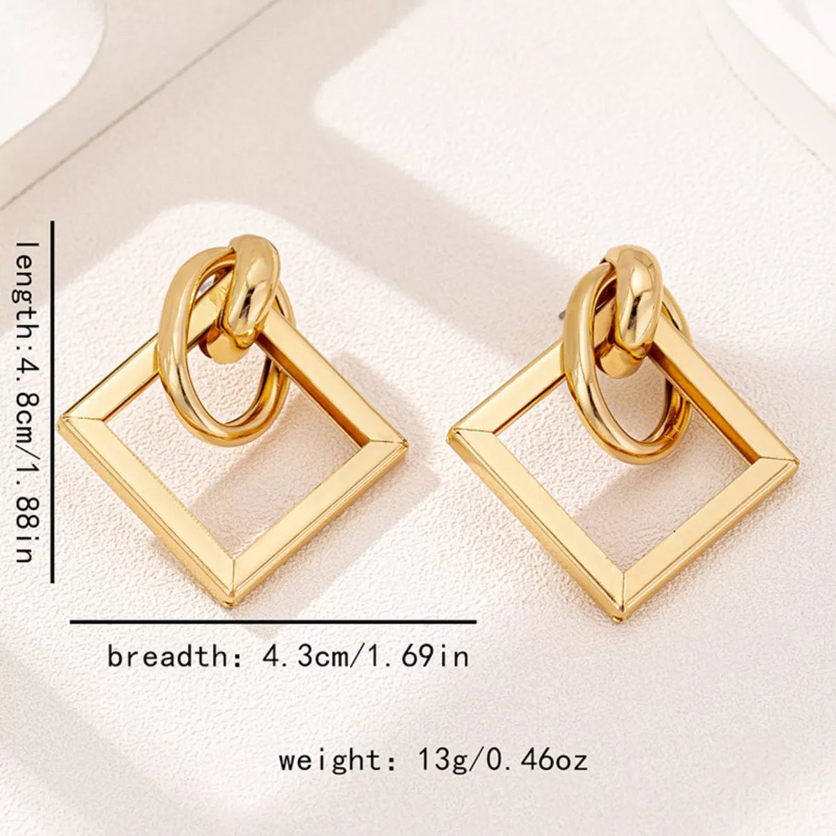 18K Gold Geometric Square Hoop Earrings displayed on a white background, showcasing their minimalist geometric design.
