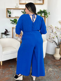 Double Take Full Size Surplice Wide Leg Jumpsuit with Pockets Trandify Deal