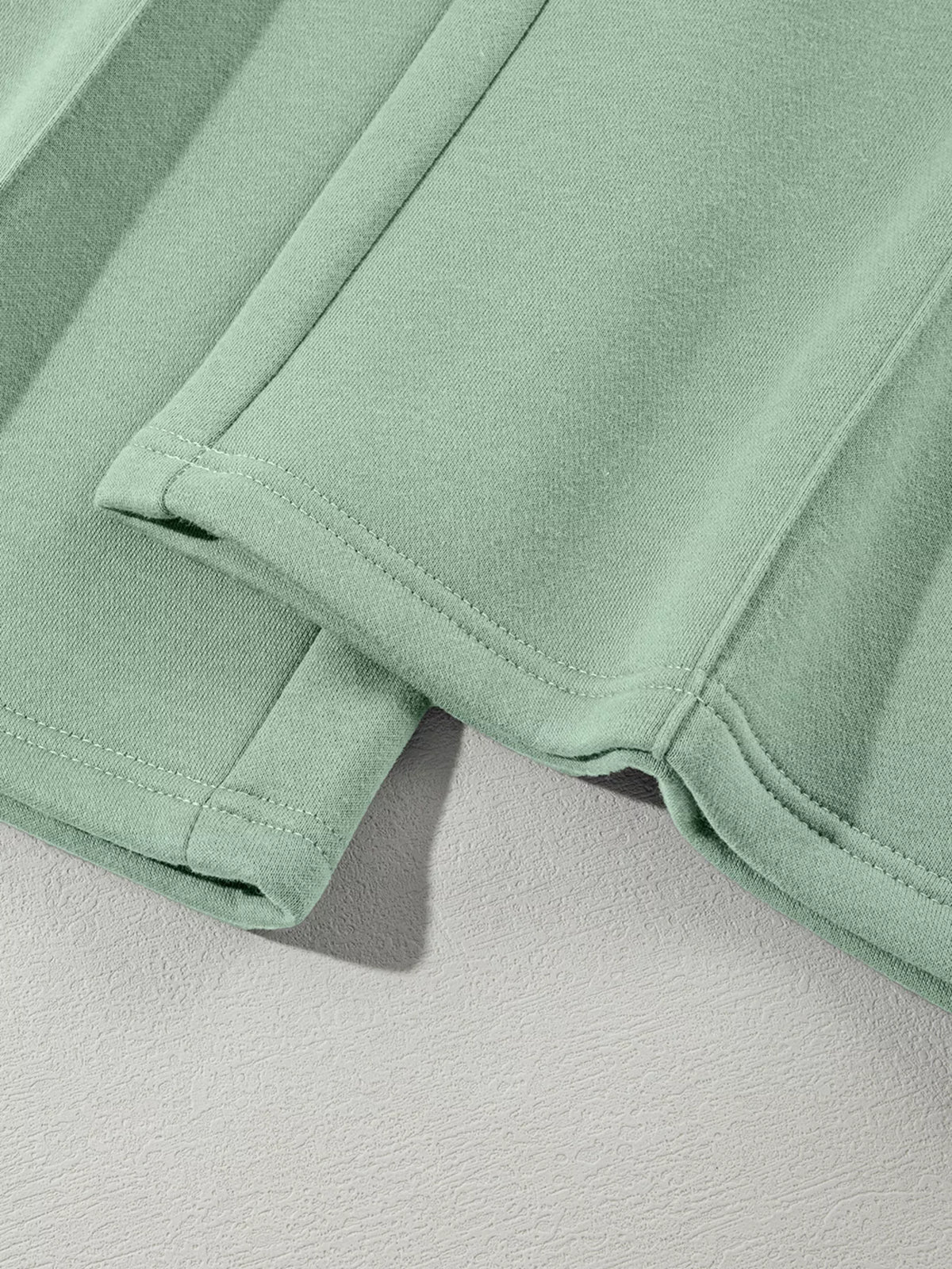 Women's Zip Up Jogger Set in Sage on model showing pockets