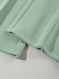 Women's Zip Up Jogger Set in Sage on model showing pockets