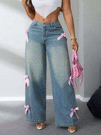 Trendy high-rise wide-leg jeans for women in black wash, perfect for casual or formal wear.
