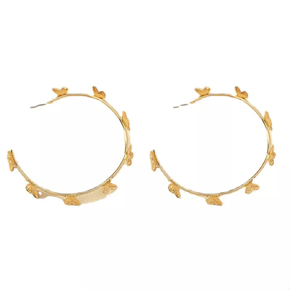 Butterfly Vine Hoop Earrings in 18K gold-plated metal, shown on a woman's ear.