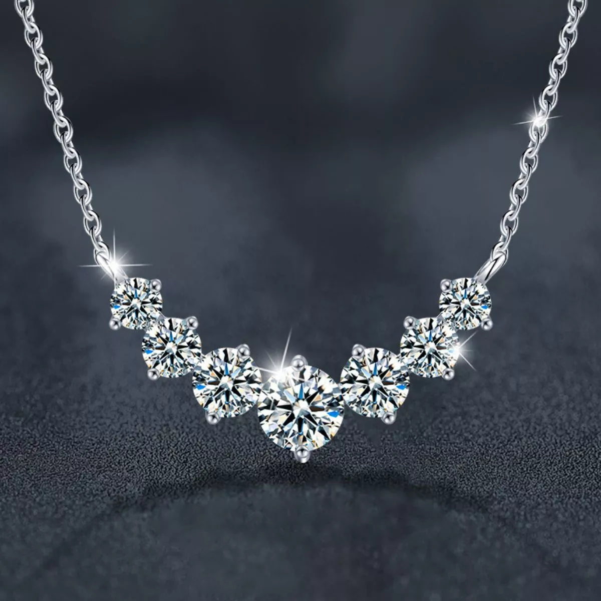 1.7ct moissanite solitaire necklace featuring sparkling diamonds set in sterling silver.