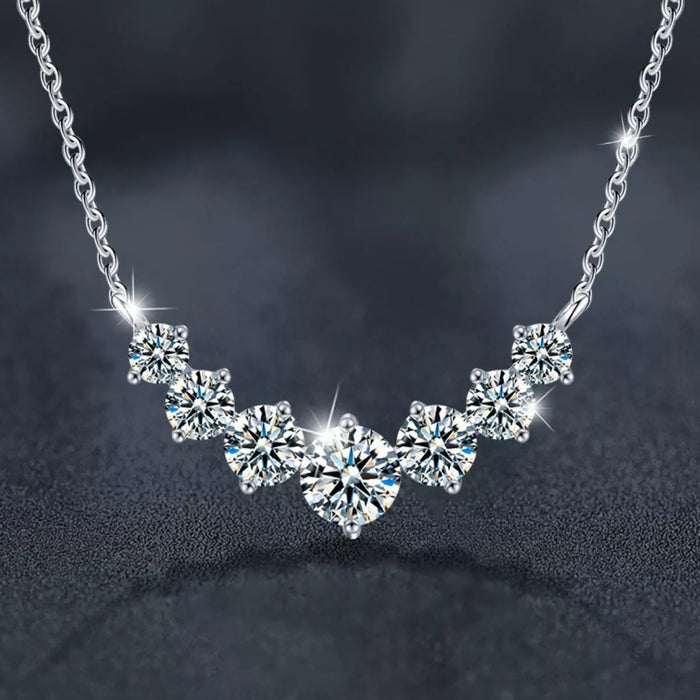 1.7ct moissanite solitaire necklace featuring sparkling diamonds set in sterling silver.