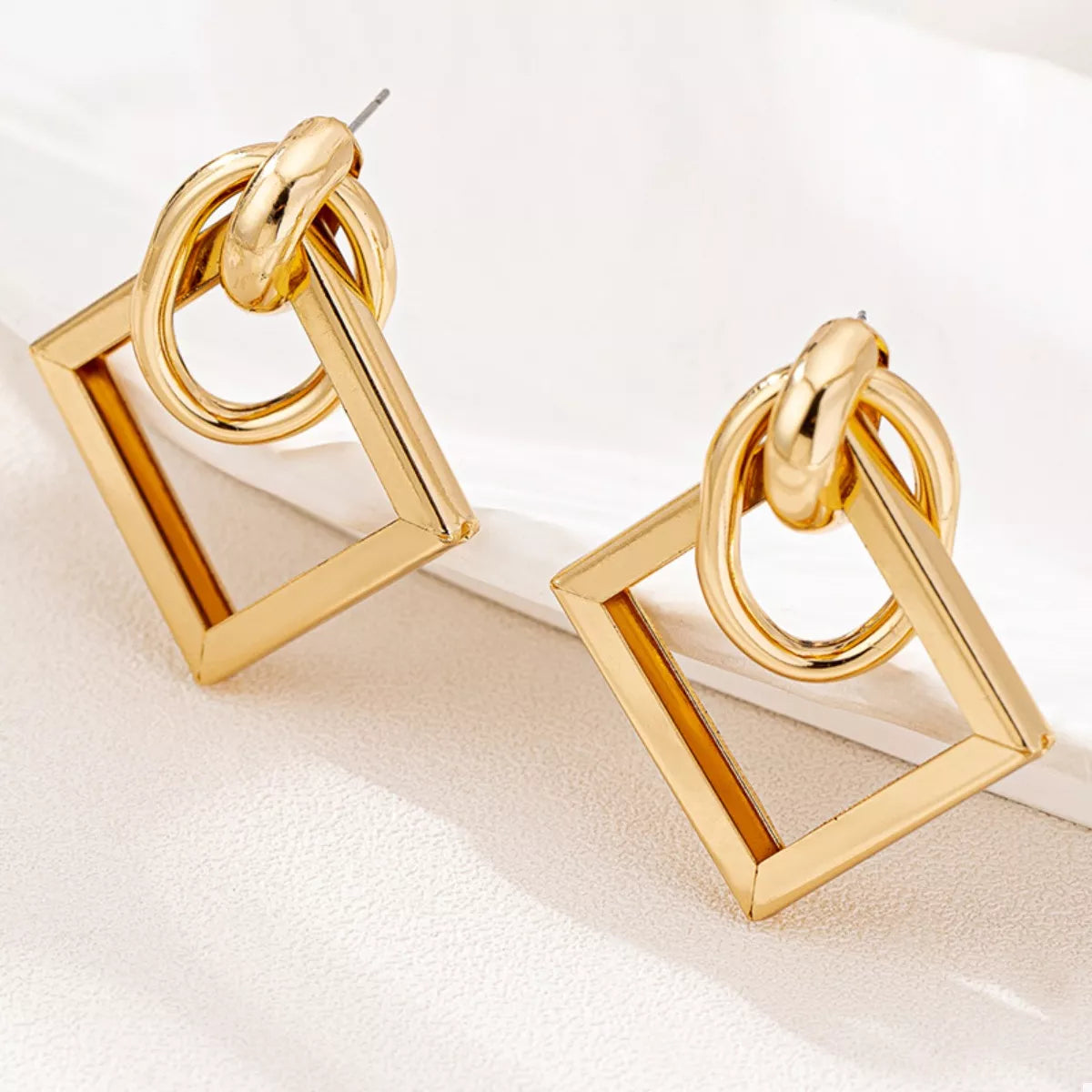 18K Gold Geometric Square Hoop Earrings displayed on a white background, showcasing their minimalist geometric design.