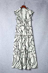 Ruffled Printed Surplice Cap Sleeve Dress Trandify deal