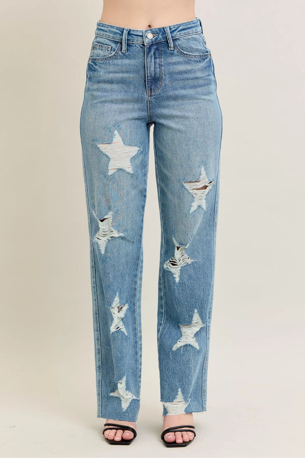 Judy Blue 90s Straight Jeans in a distressed wash, modeled from the front, showing the high waist and straight leg fit.