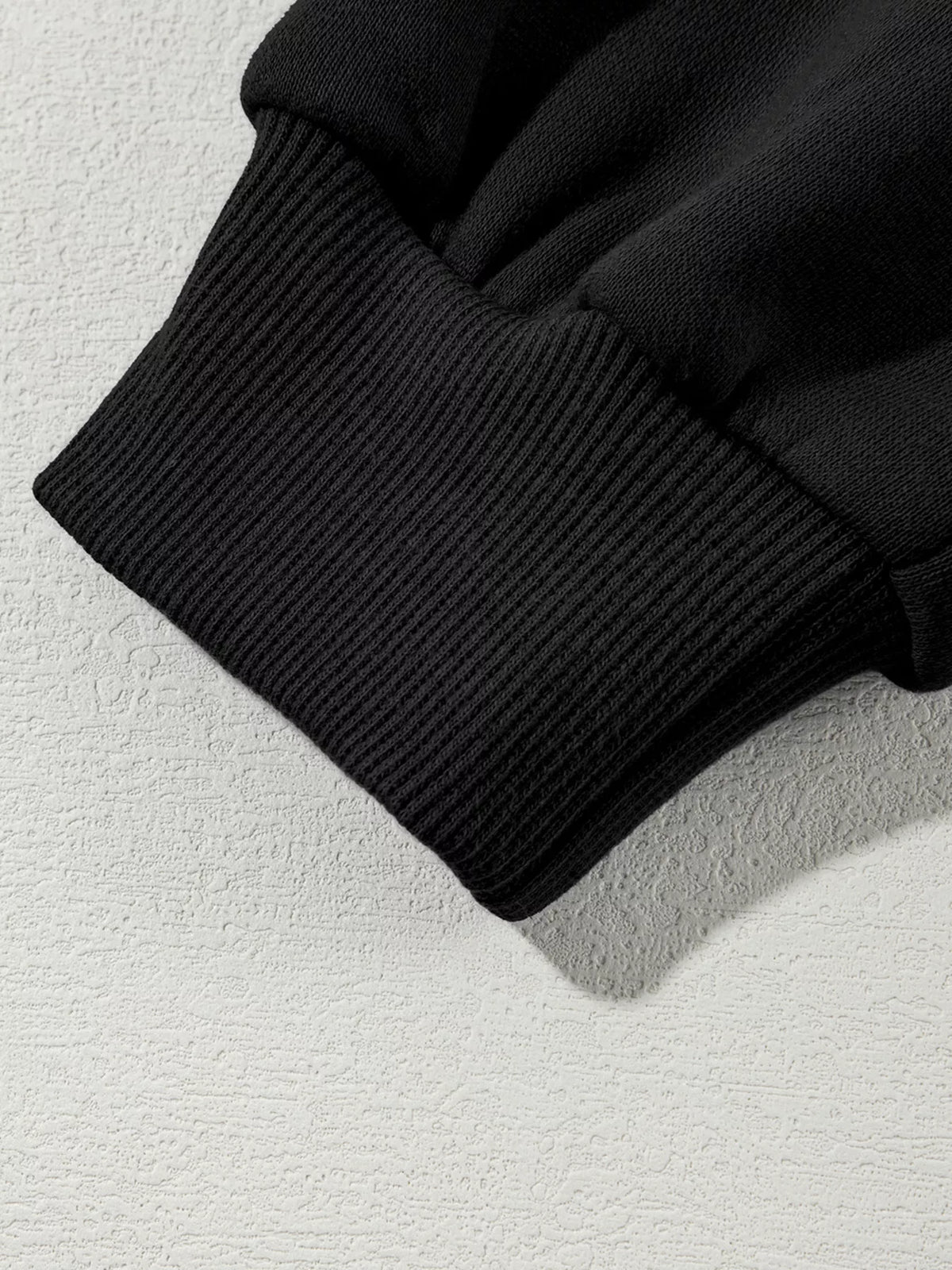Women's Zip Up Jogger Set in Black on model showing pockets