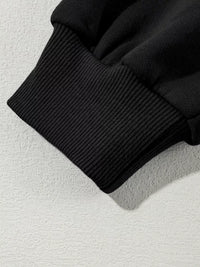 Women's Zip Up Jogger Set in Black on model showing pockets