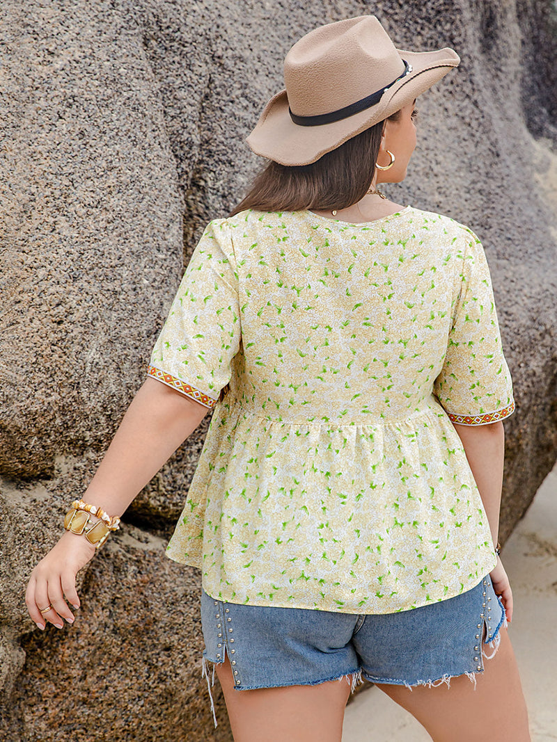 Plus Size Printed Tie Neck Half Sleeve Blouse Trandify deal