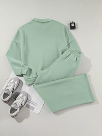 Women's Zip Up Jogger Set in Sage on model showing pockets