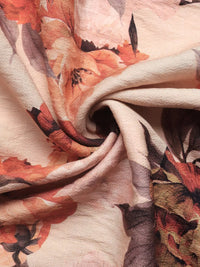 Close-up of smocked bodice and floral print on viscose dress