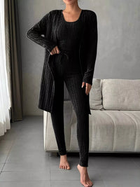 Cozy at home in a stylish ribbed cardigan and pants matching set