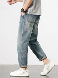 Mens loose fit washed jeans front view, relaxed regular fit casual denim pants