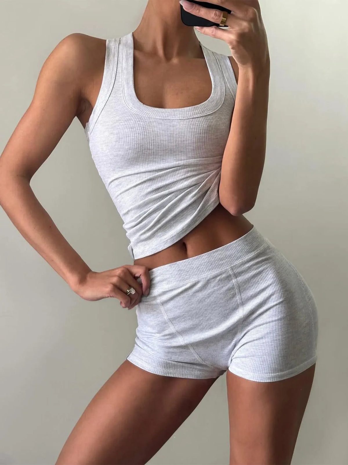 Women’s ribbed tank top and high-waisted shorts active set for gym workouts and summer lounging