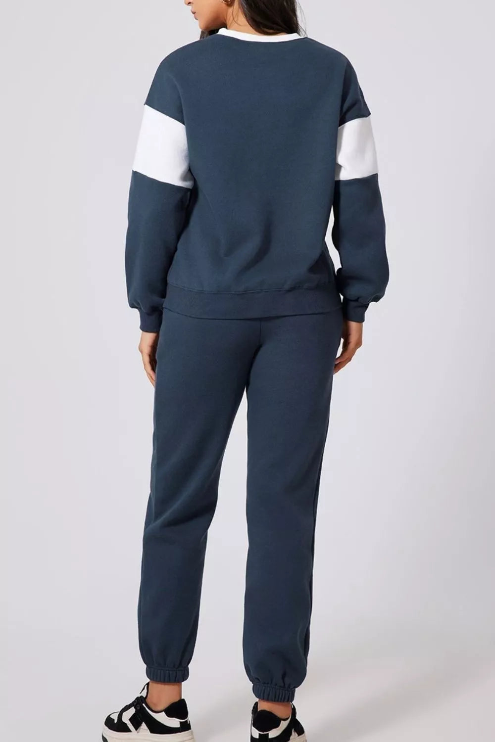 Women's Oversized Loungewear Set in Navy, featuring a drop-shoulder sweatshirt and matching joggers on a model.