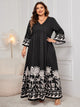 Plus Size Printed V-Neck Long Sleeve Maxi Dress Trandify Deal