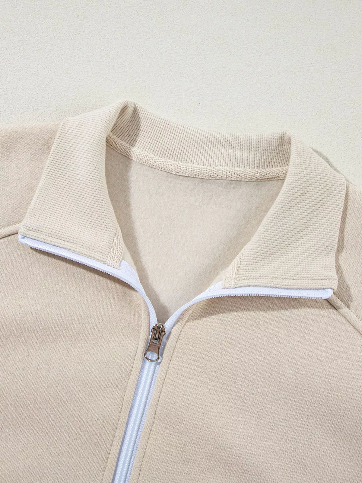 Women's Zip Up Jogger Set in Beige on model showing pockets