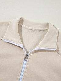 Women's Zip Up Jogger Set in Beige on model showing pockets