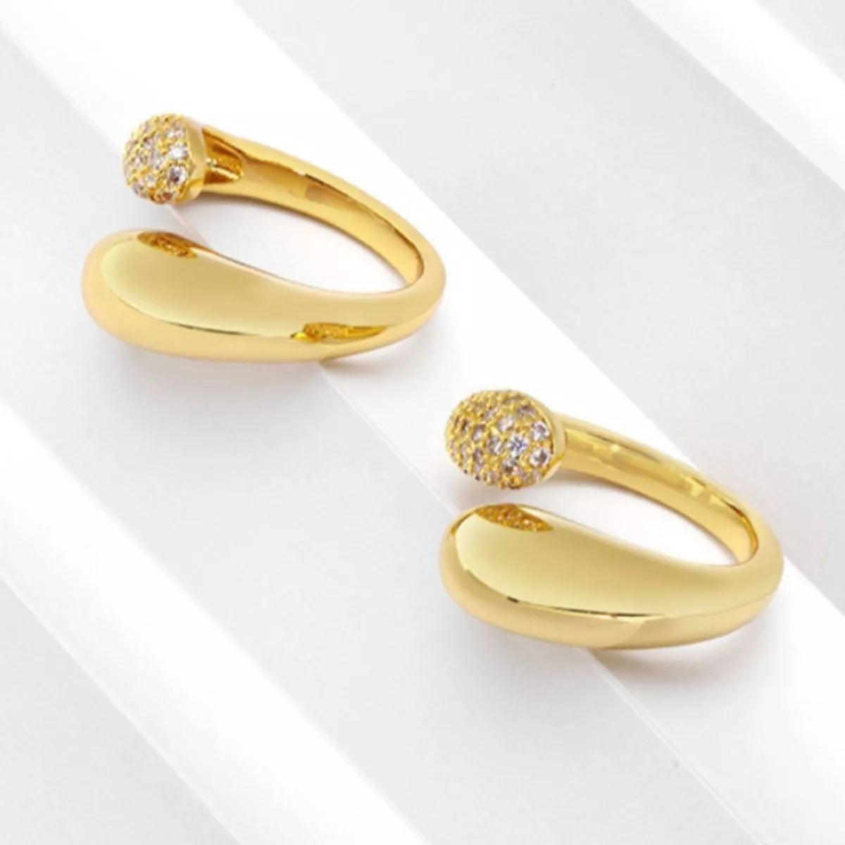 18K Gold Plated Open Ring with Crystal on a model's hand, showcasing its stackable design