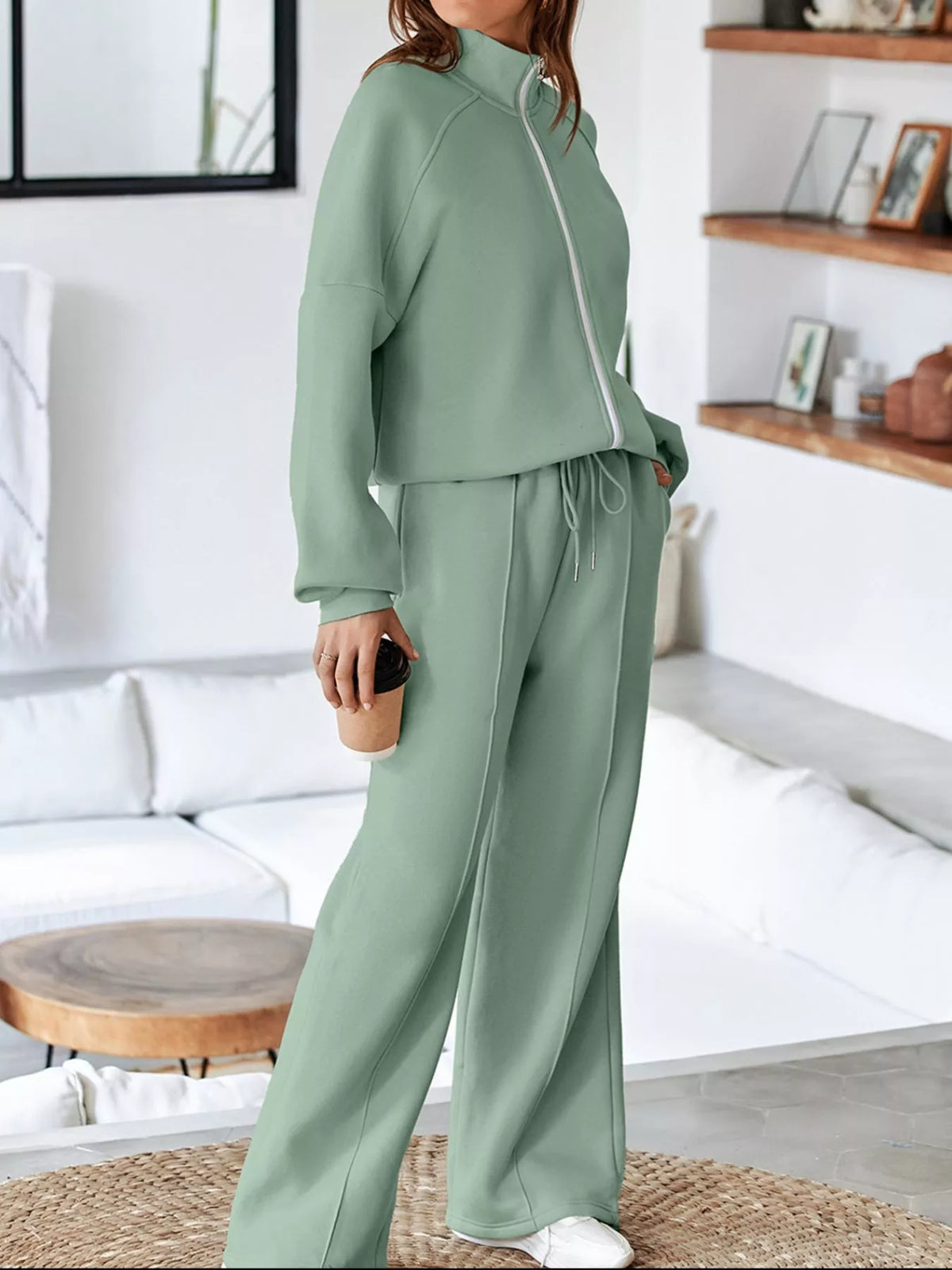 Women's Zip Up Jogger Set in Sage on model showing pockets